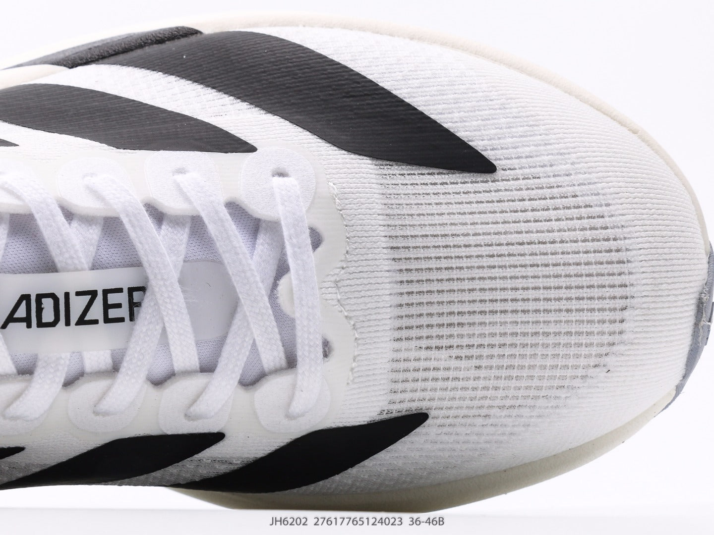 adidas Adizero Evo SL – أبيض/أسود | قوة الأداء وأناقة التصميم